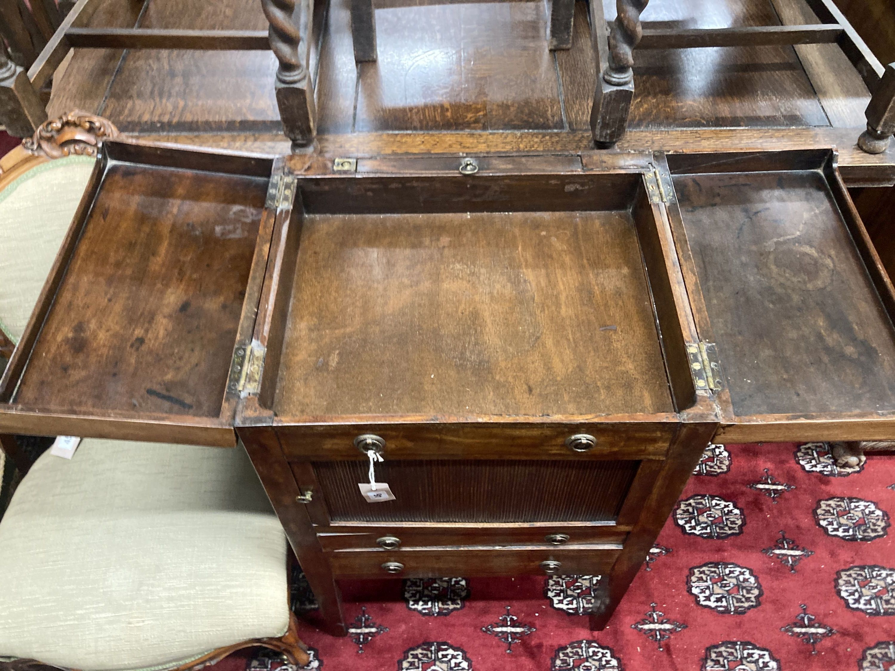 A George III mahogany tambour front enclosed washstand, width 53cm, depth 45cm, height 87cm